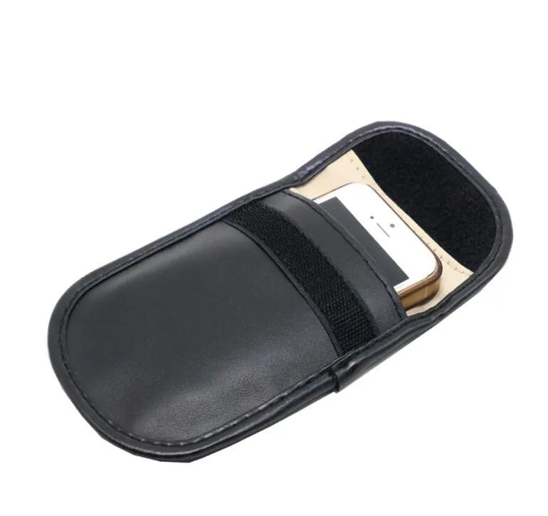 Black microfiber Faraday cage bag for blocking car key fob and mobile phone signals.