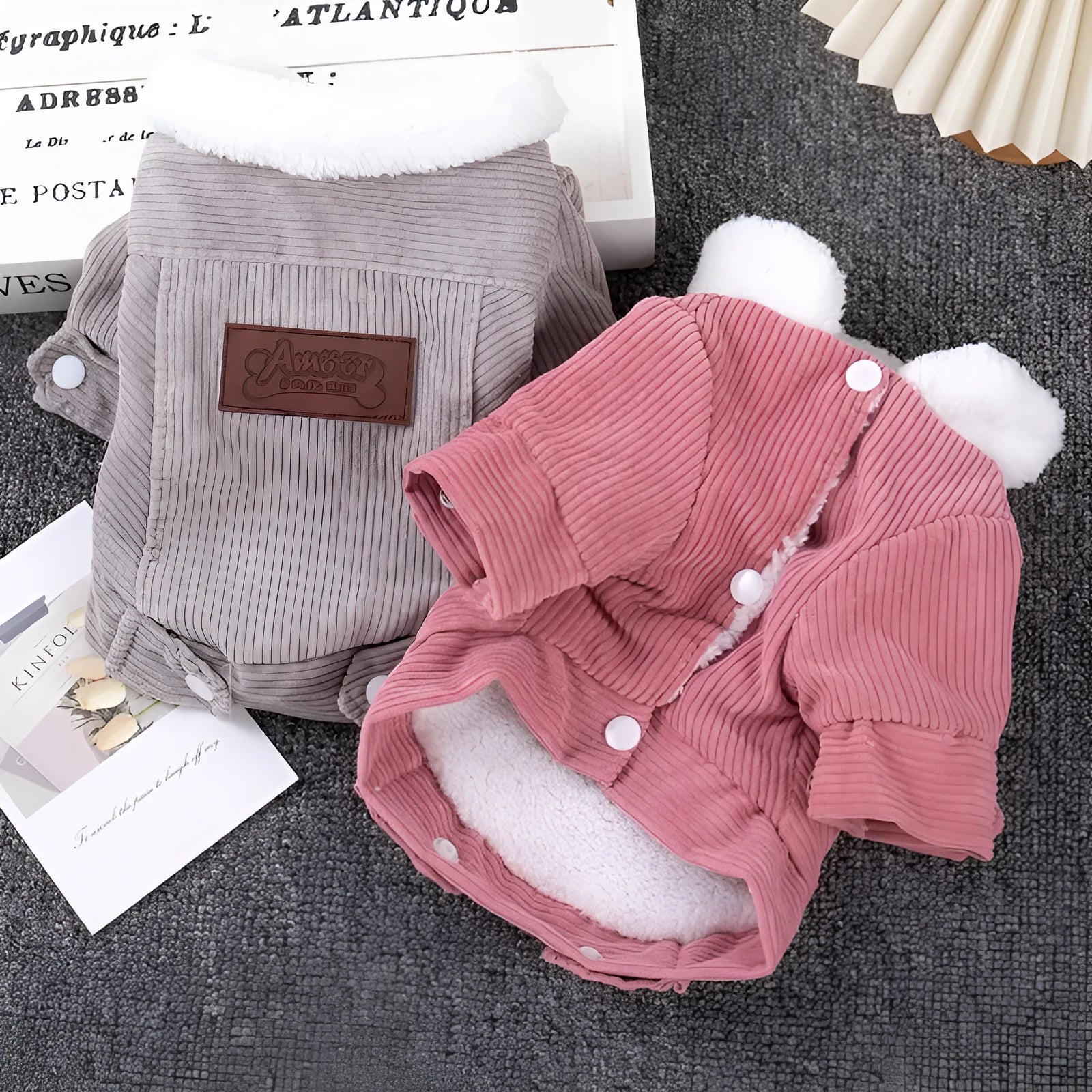 Lambswool grey fleece lined padded vest for dogs on a white background.
