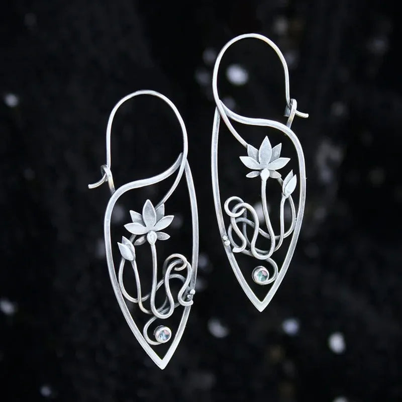 Silver electroplated lotus vine earrings with floral design and geometric round elements