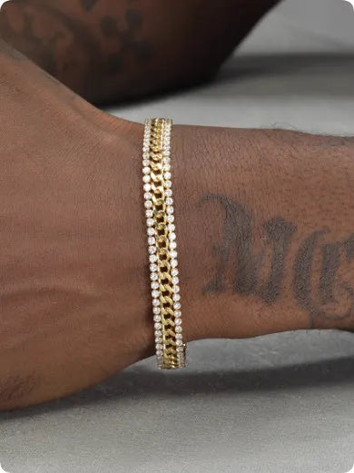 Gold tennis bracelet with stone detailing on titanium steel band