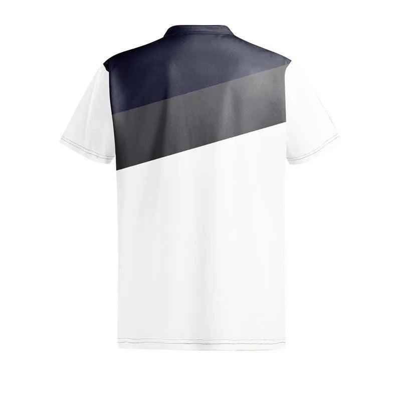 Man wearing a loose-fit grey T-shirt with a colourful abstract 3D digital print on the front.
