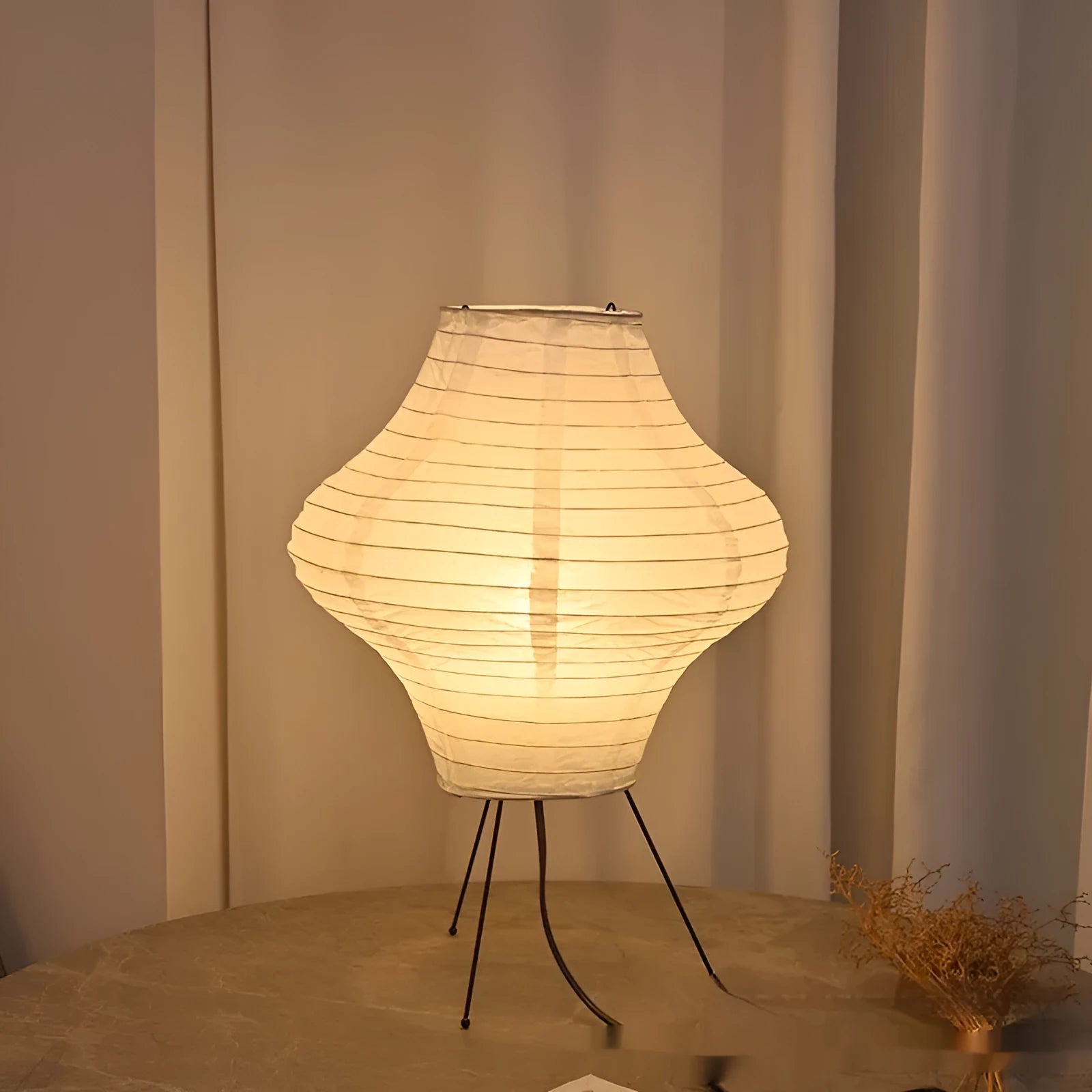 Japanese-style Xuan paper table lamp with a white shade on a wooden base.