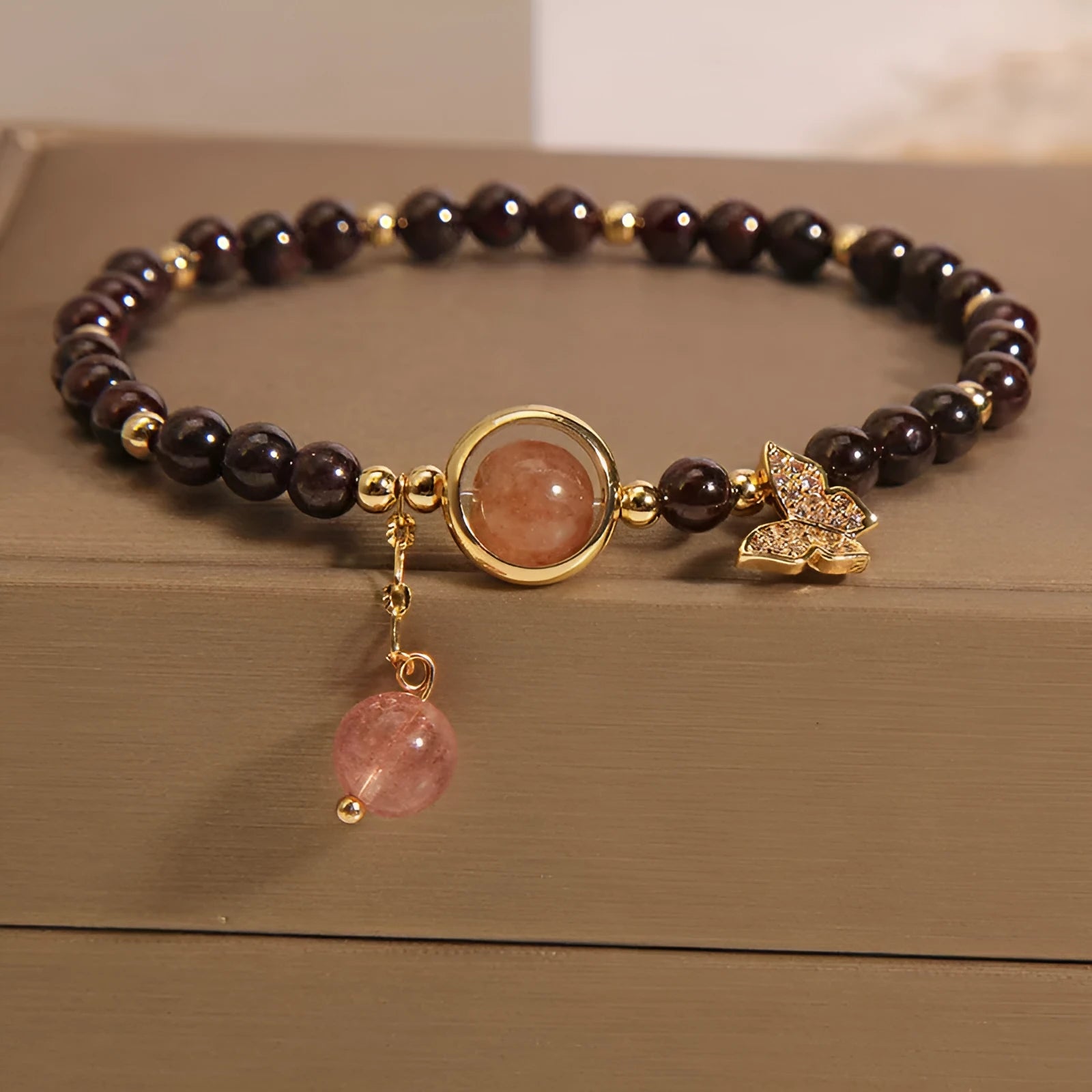 Black stone micro inlay butterfly pendant bracelet on wrist