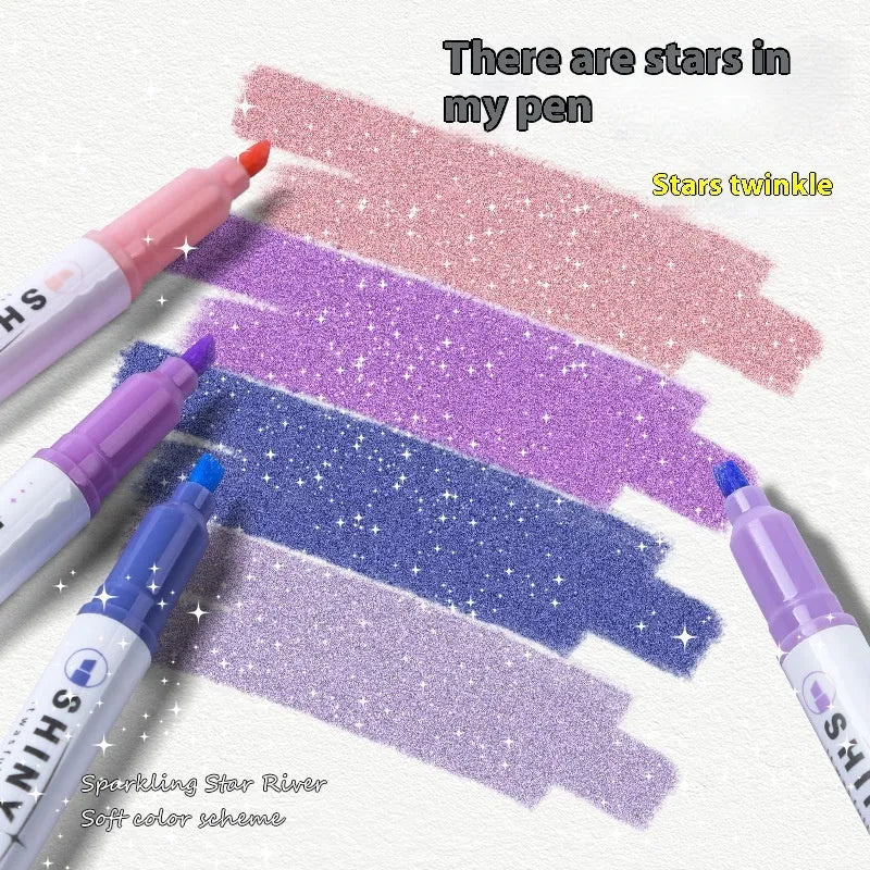 Four glitter highlighter pens with pastel colours and slanted tips on a notebook.