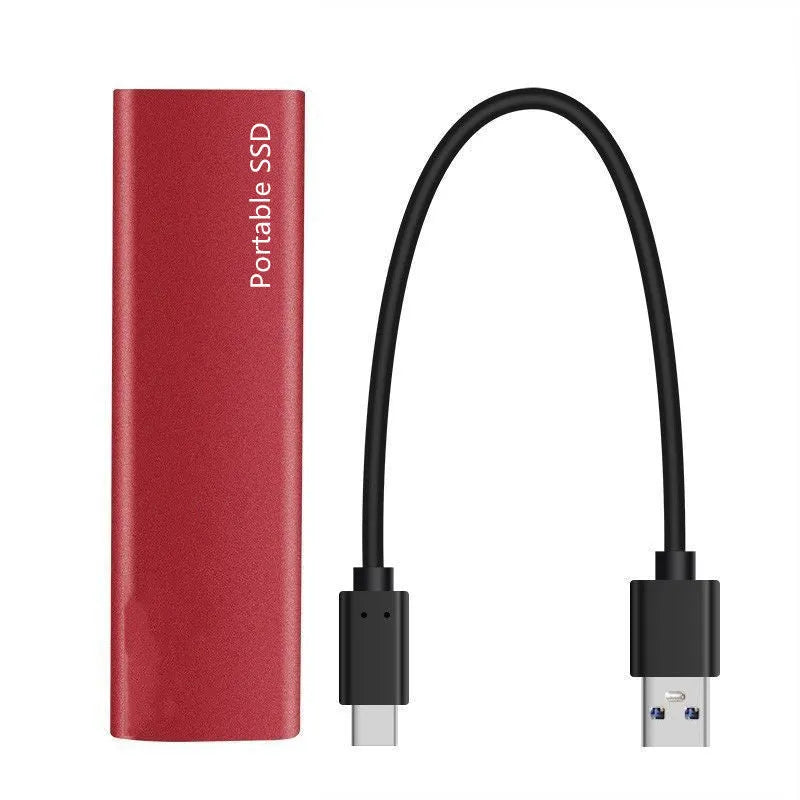 Metal-shell portable solid state drive with ultra-thin design on a desk.