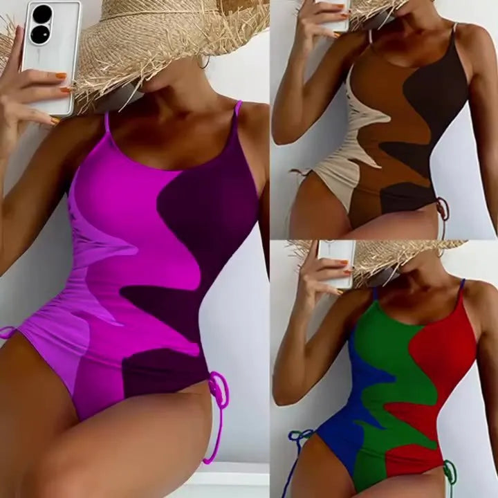 Blue women's sleeveless one-piece swimsuit with fixed swimming trunks on a mannequin.