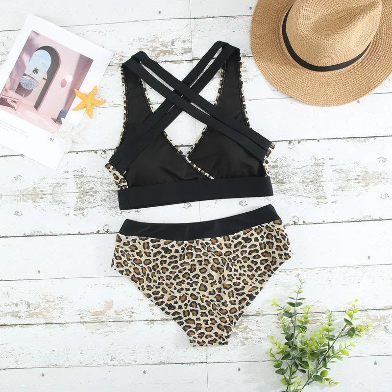 Leopard print women's bikini swimsuit with cross banded construction and V-neck design
