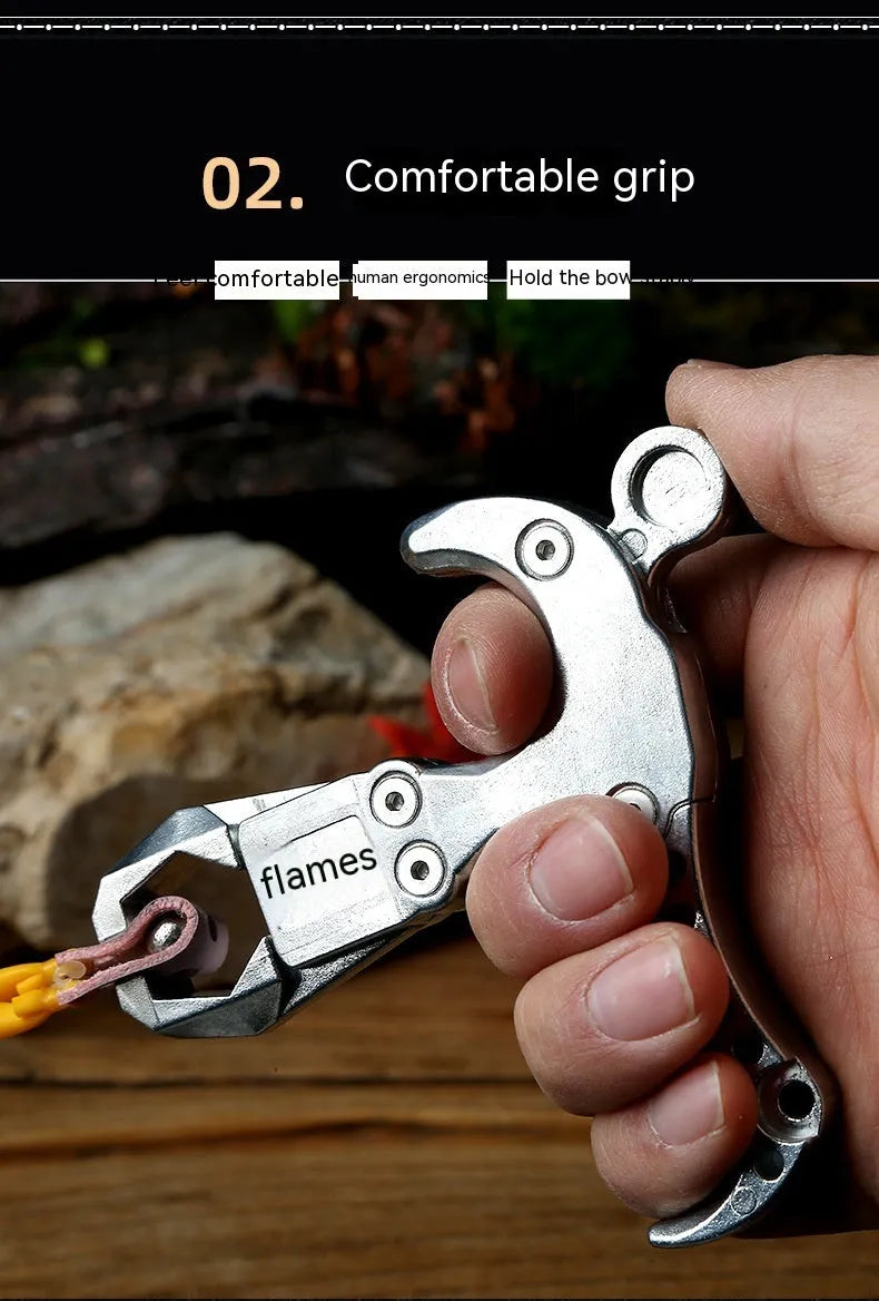 Zinc alloy archery release aid with a two-axis harpoon clip mechanism and stainless steel component.