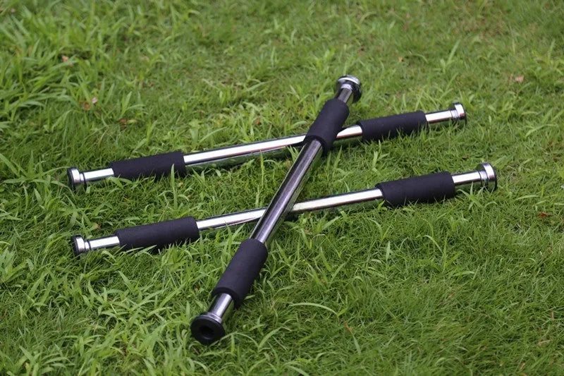Adjustable steel pull-up bar extended for doorway installation with length markings showing 62cm to 100cm range