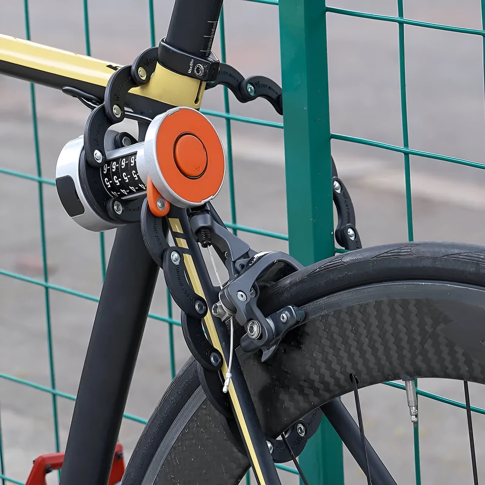 Portable bicycle folding lock shown in folded and extended positions with zinc alloy construction