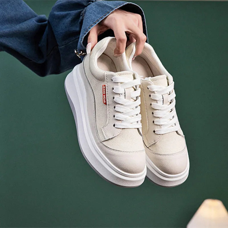 Women's beige thick-soled leather board shoe with a cowhide upper.