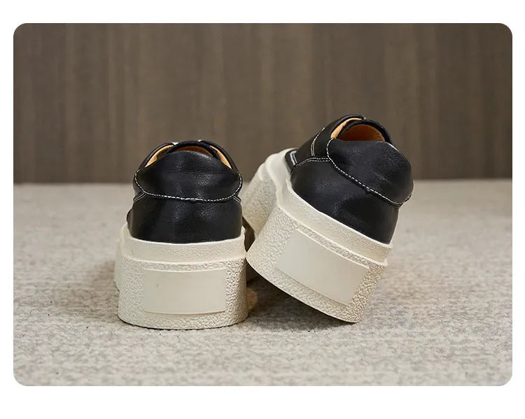 Women's black and white platform casual shoes with embossed cowhide leather and round toe design