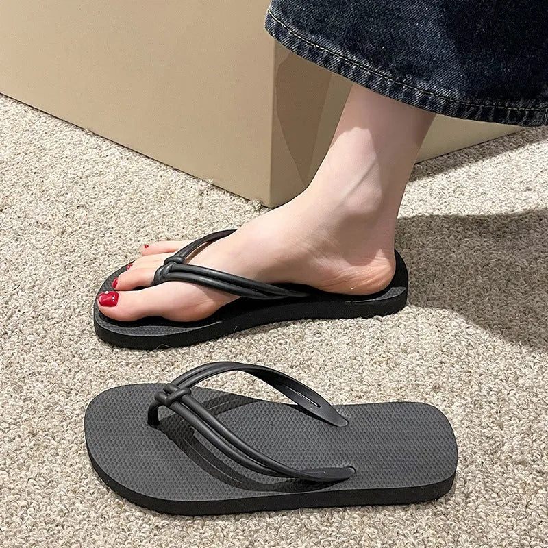 Men's closed-toe PVC flip flops in multiple colours on a plain background.