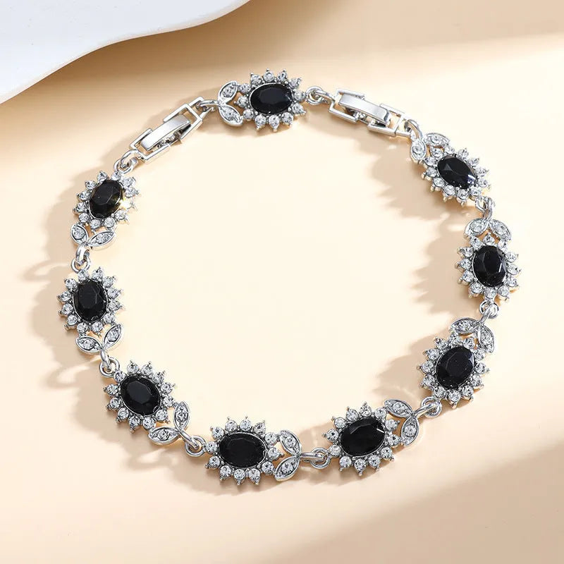 Women's simple alloy bracelet with inlaid zircon stones in nine colour variations