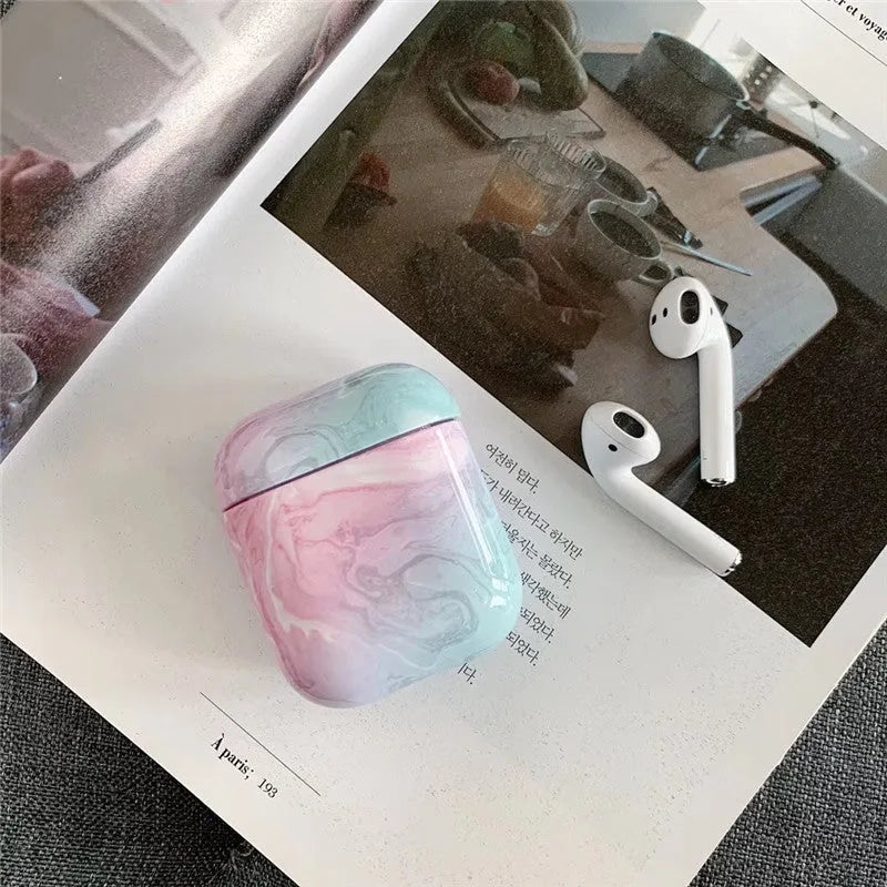 White marble pattern hard protective case for AirPods 1 and AirPods 2 wireless charging box.