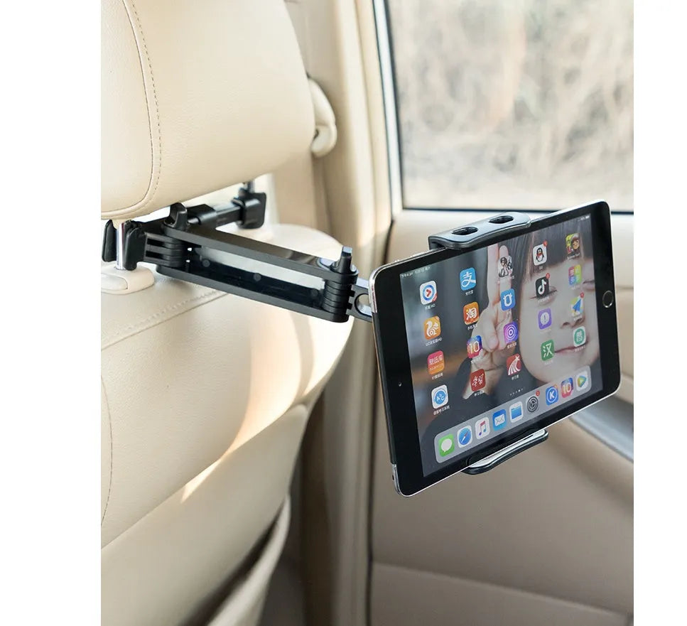 Black plastic car phone holder with universal tablet compatibility mounted on vehicle rear seat