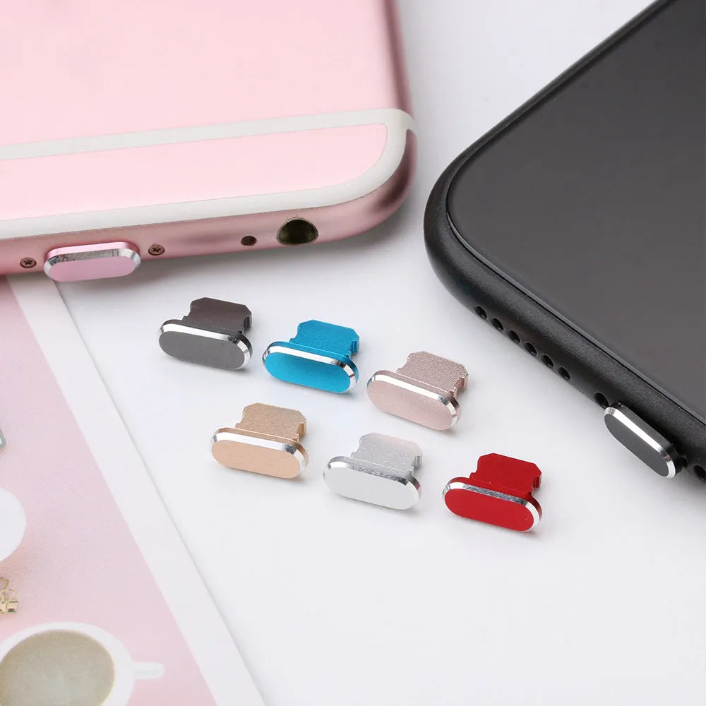 Aluminium alloy dust plug for iPhone charging port in various colours including gold, silver, and rose gold.
