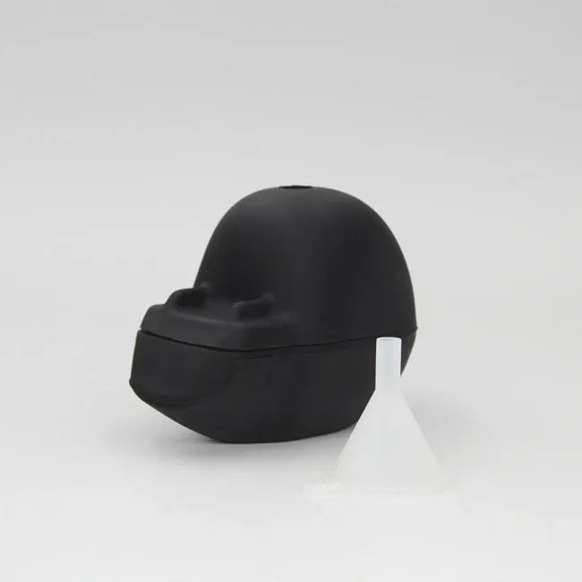 3D Halloween skull-shaped silicone ice cube tray on a white background.