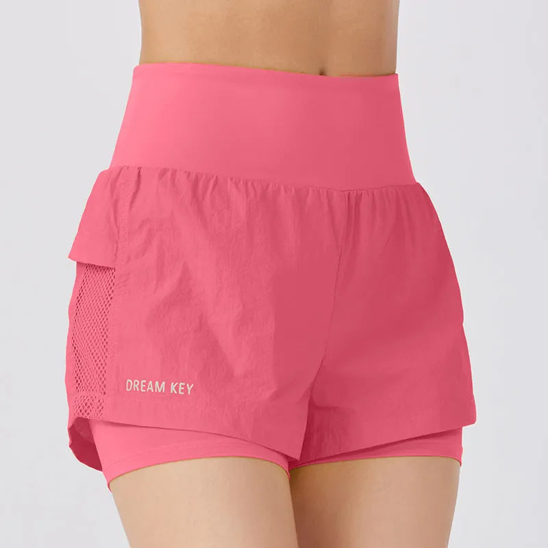 Women's loose casual cotton blend quick-drying sports shorts in multiple colours on a hanger.