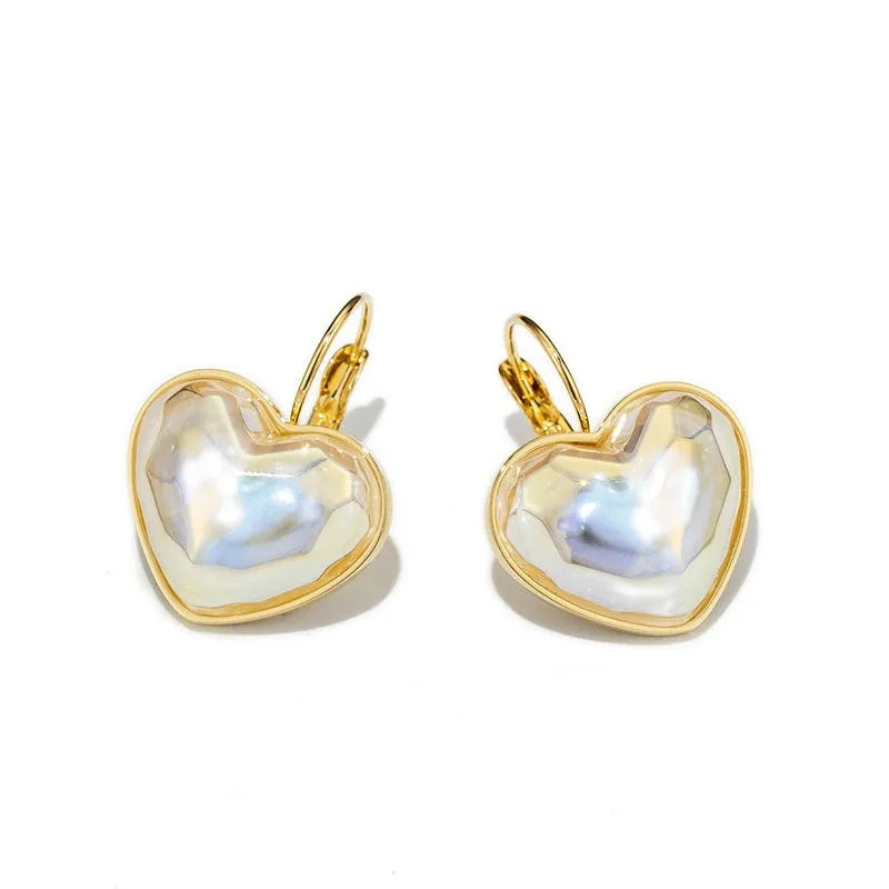 Gold-coloured alloy ear clips with summer love design and clip-on mechanism