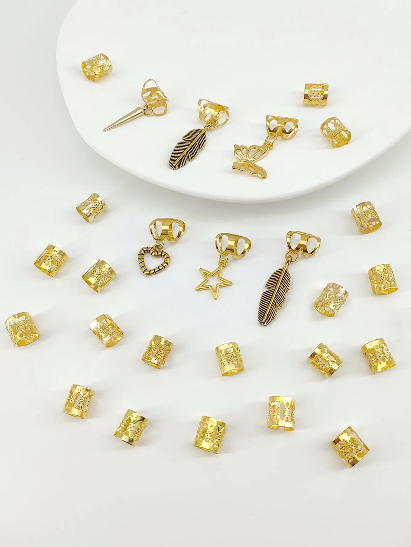 Pack of 26 alloy hair rings with antique leaf design in gold or silver electroplated finish
