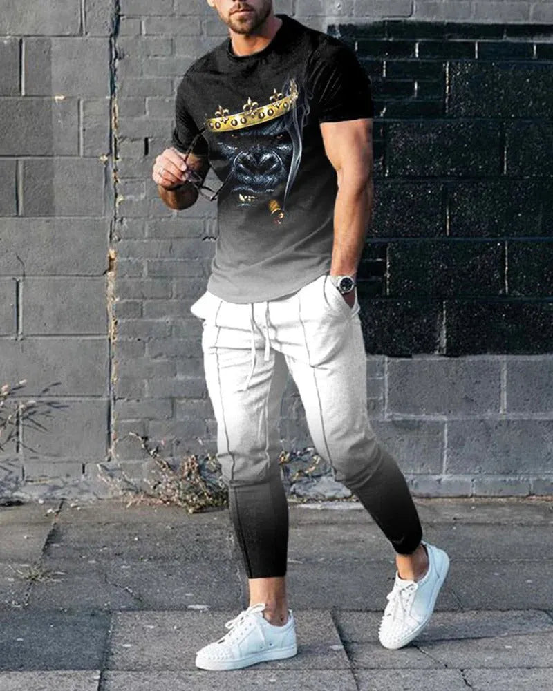 Man wearing a short-sleeved printed round neck pullover and matching trousers from a lightweight athletic suit set.