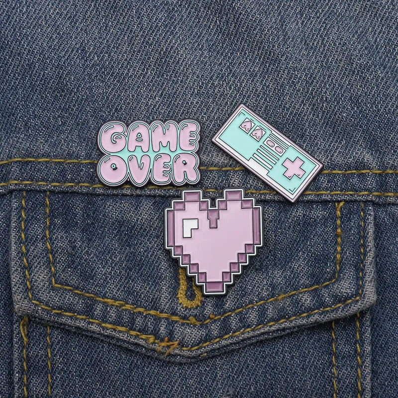 Alloy metal stereo game console badge with embossed design in multiple colour options