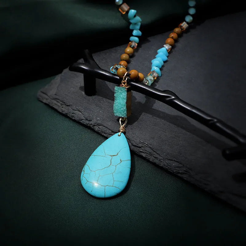 Blue turquoise water drop pendant necklace with heart-shaped gem inlay on ball bead chain