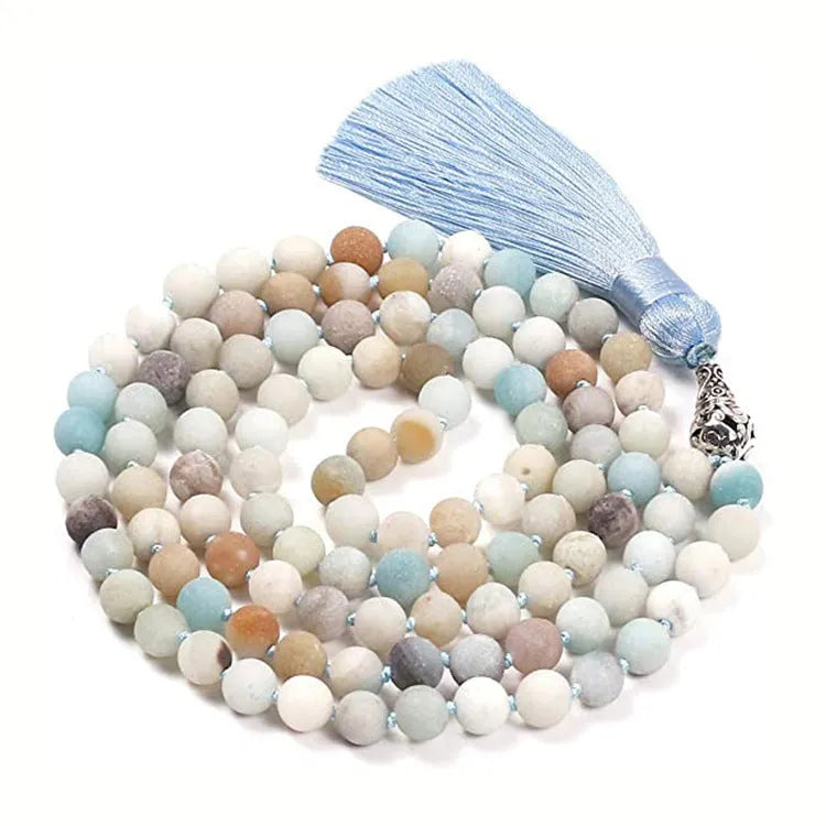 Long multi-strand agate tassel necklace with geometric pattern of amethyst, lapis lazuli, and blue stone beads.