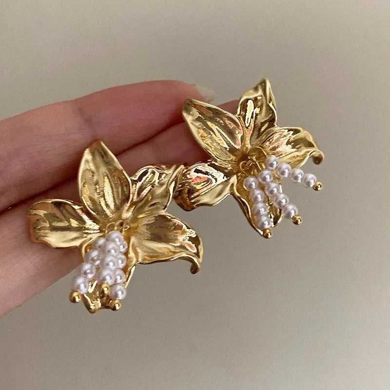 Gold H1795 pearl flower earrings with exaggerated floral design and Seiko-treated metal construction