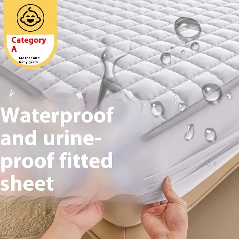 Washed cotton waterproof fitted sheet in light grey colour with elasticated corners on a mattress