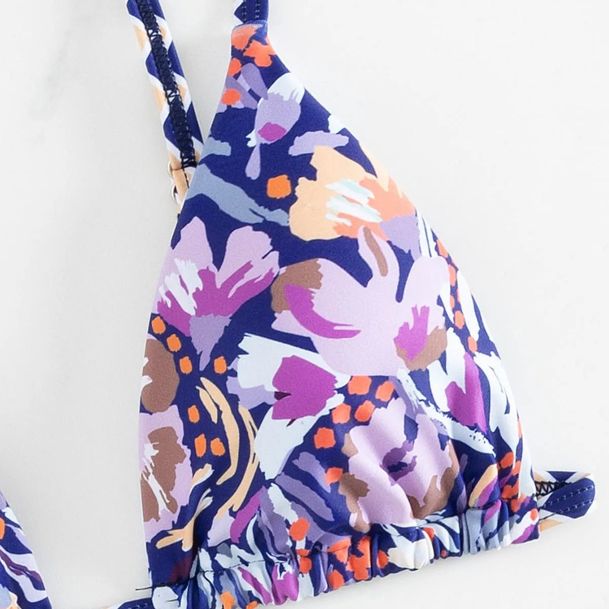 Women's floral print triangle bag swimsuit briefs in polyester with S M L sizing