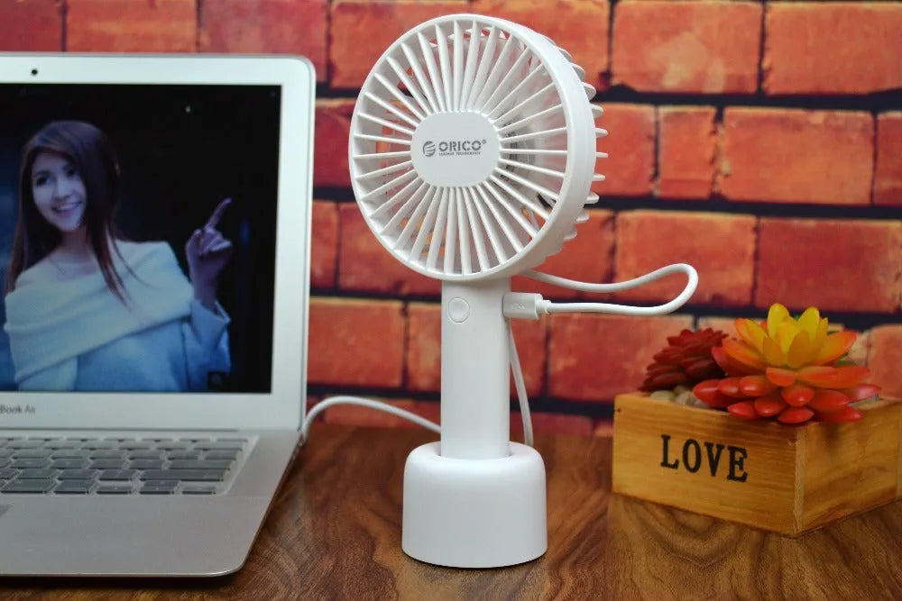 ORICO FH1 white USB rechargeable desk fan with handheld portable design and three-speed control
