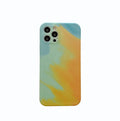 Soft silicone iPhone case with abstract blue gradient geometric design on a phone.