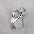 Geometric ellipse women's ring with inlaid zircon stones in Q941 white gold plating