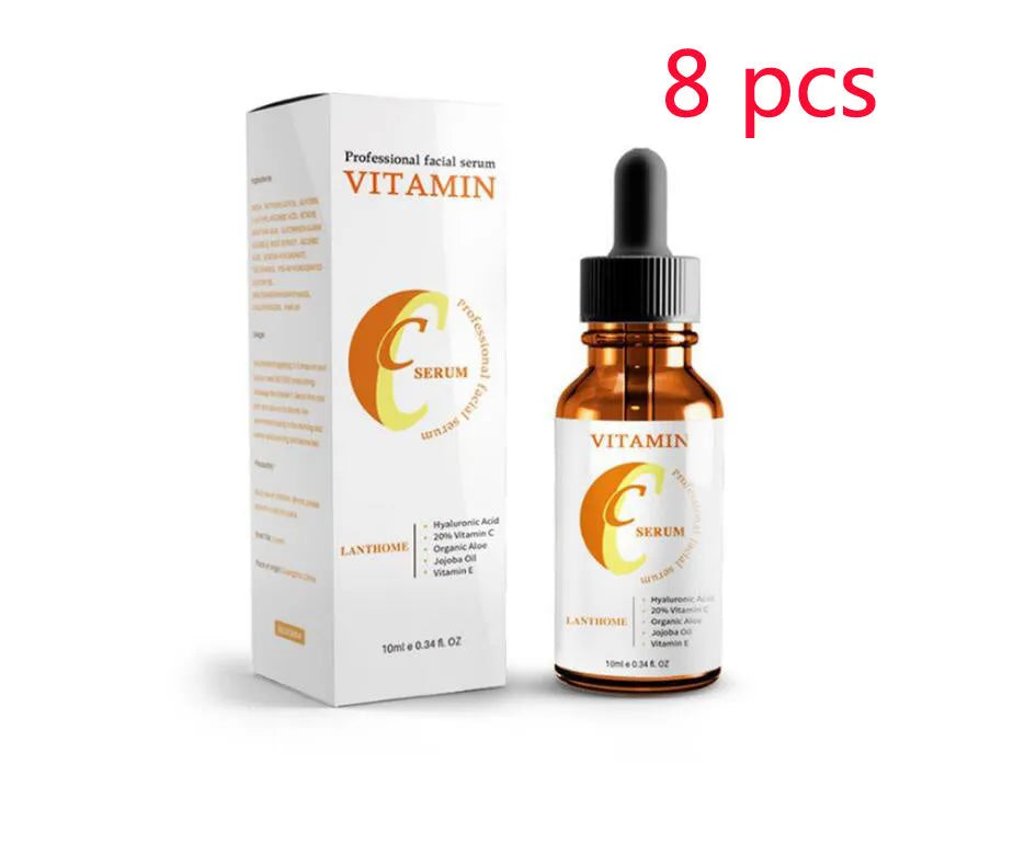 Bottle of Vitamin C and Hyaluronic Acid facial serum for anti-aging and skin brightening.