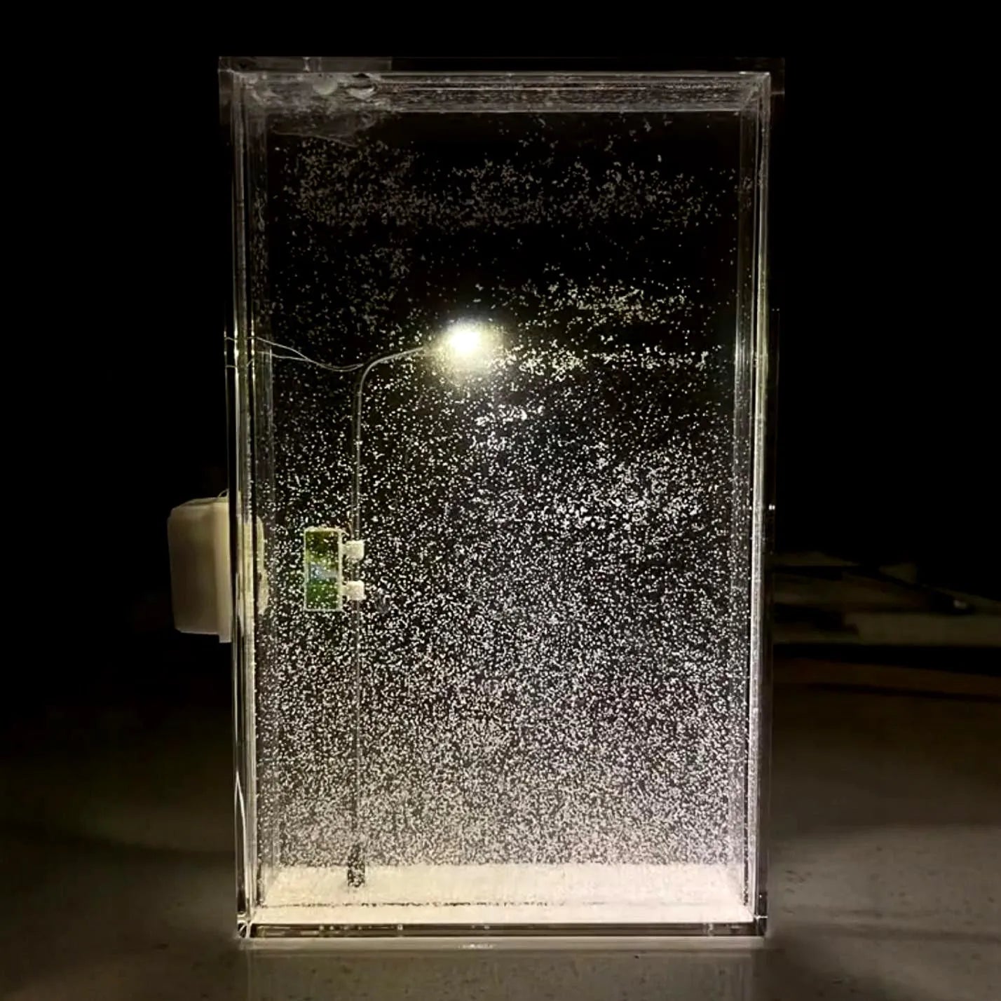 DIY Christmas night light kit components for building a snowy landscape scene with LED street lamp.