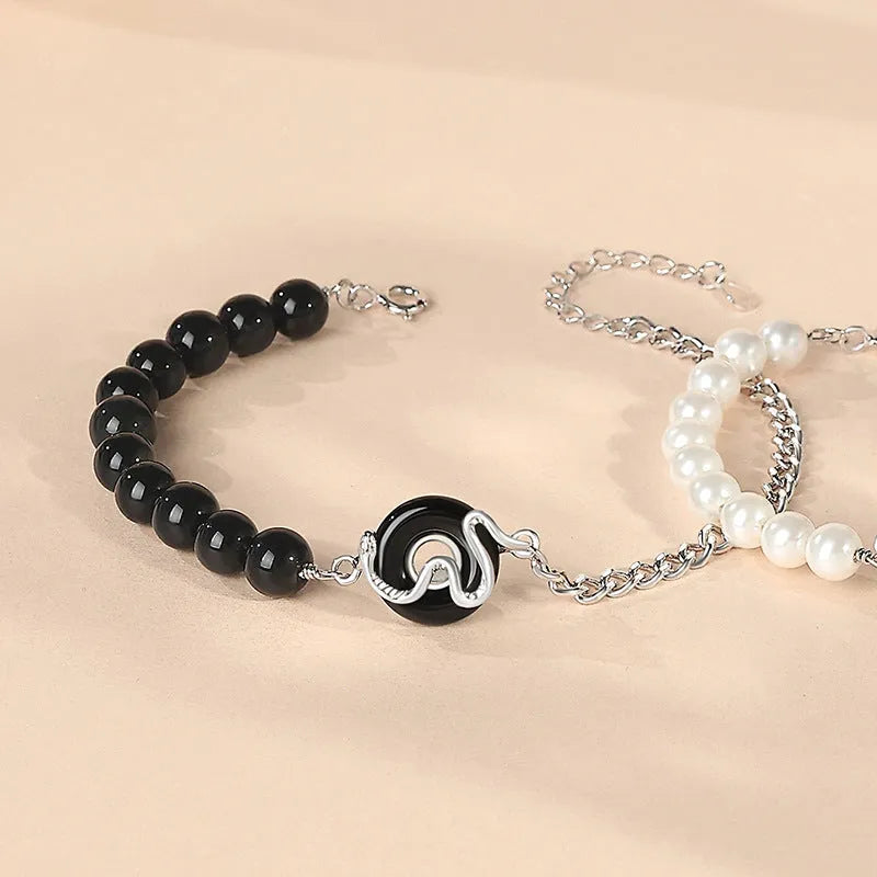 925 sterling silver couple's bracelet with a peace buckle and snake design in New Chinese style.