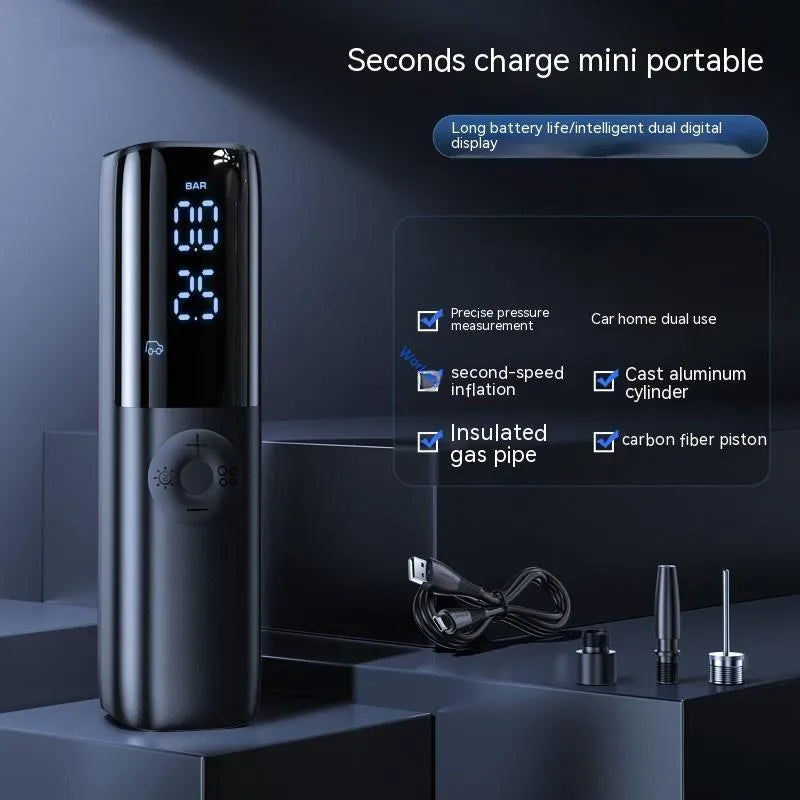 Black portable electric car air pump with plug-in connection and pressure gauge