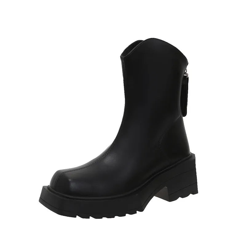Black platform Martin boots for women with square toe, high heel, and back zip on a white background.