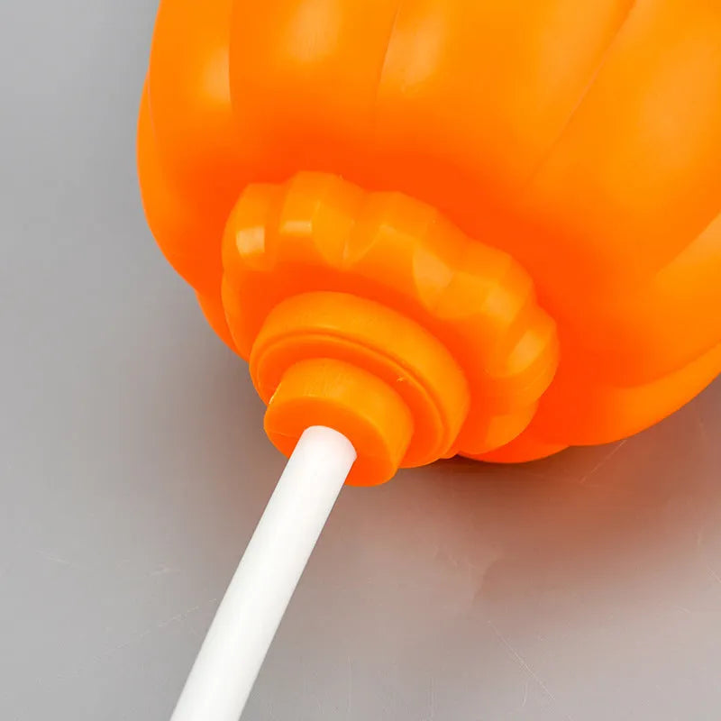 Purple and yellow light USB rechargeable plastic pumpkin lamp for Halloween decoration.