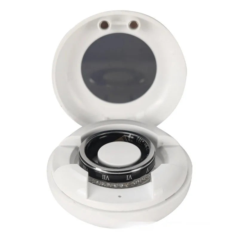 Silver and gold smart rings with diamond inlay displaying blood oxygen monitoring functions