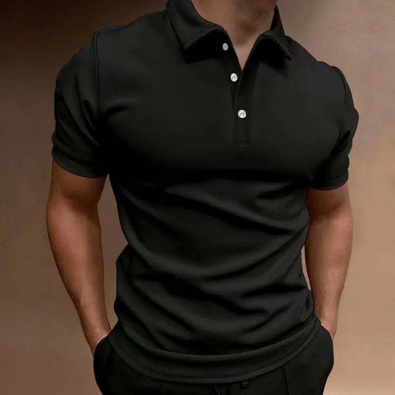 Man wearing a grey loose fit cotton blend short sleeve t-shirt for casual leisure wear.