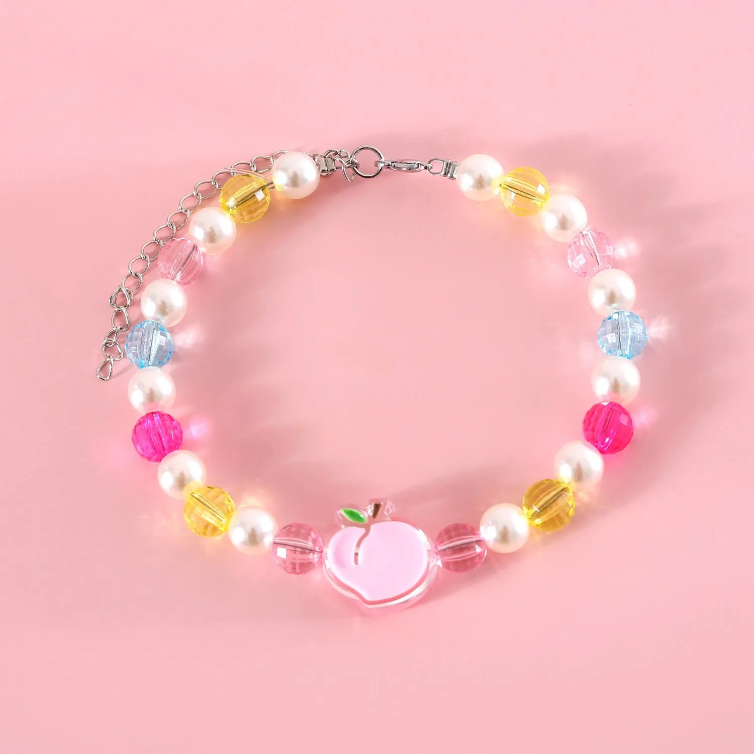 Colourful plastic bead cat necklace adjustable for pet wear in rainbow, peach, or small flower patterns