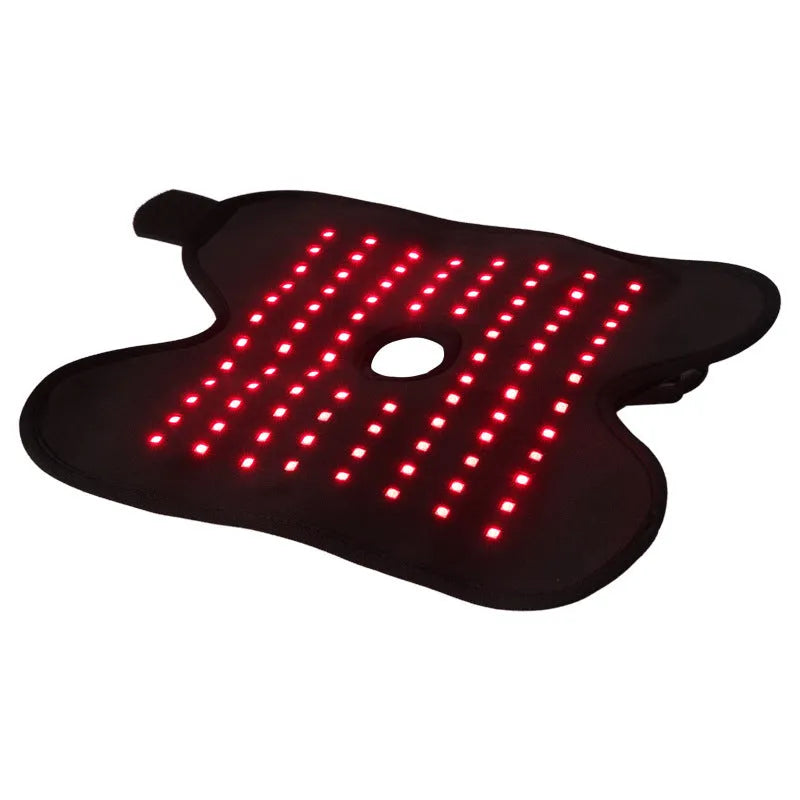 Black physical therapy ankle support with red light heat compress and USB cable