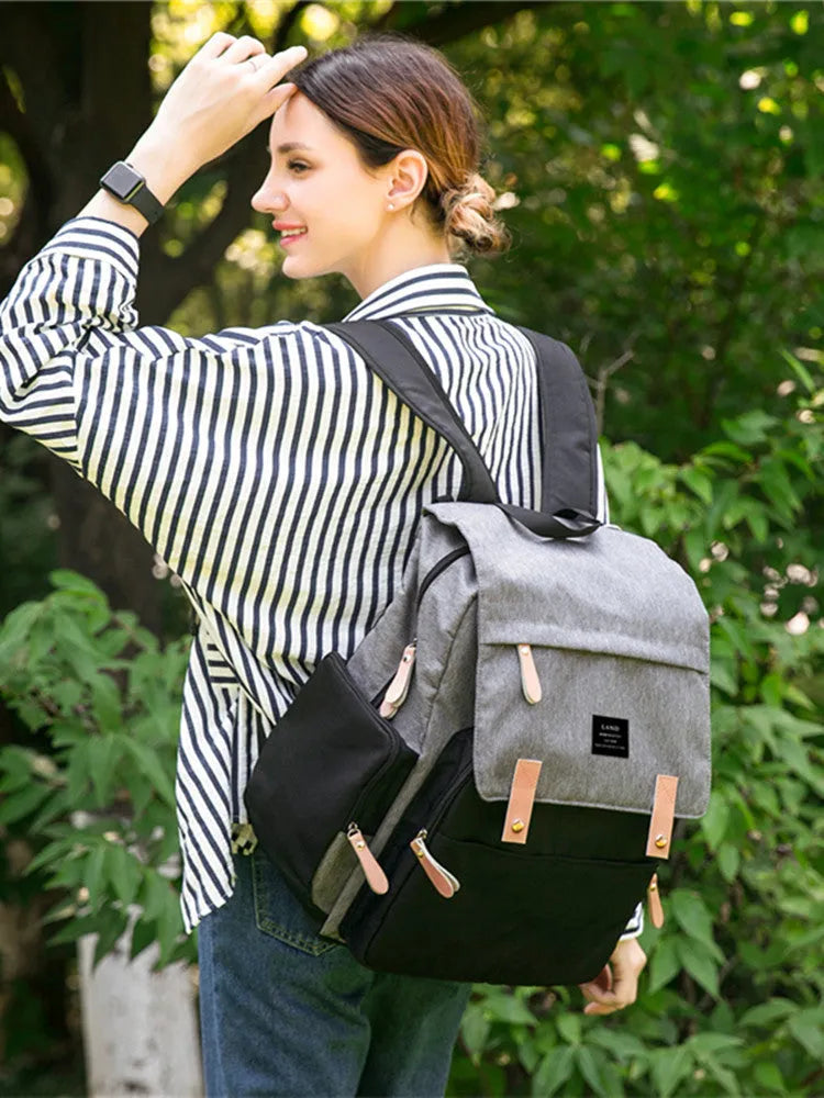 LAND Mommy large Oxford cloth diaper backpack with changing mat in various colours.