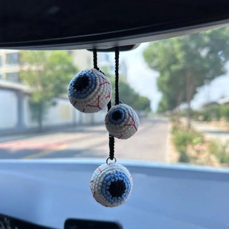 Plush hand-woven car hanging ornament in a cartoon design made from polyester