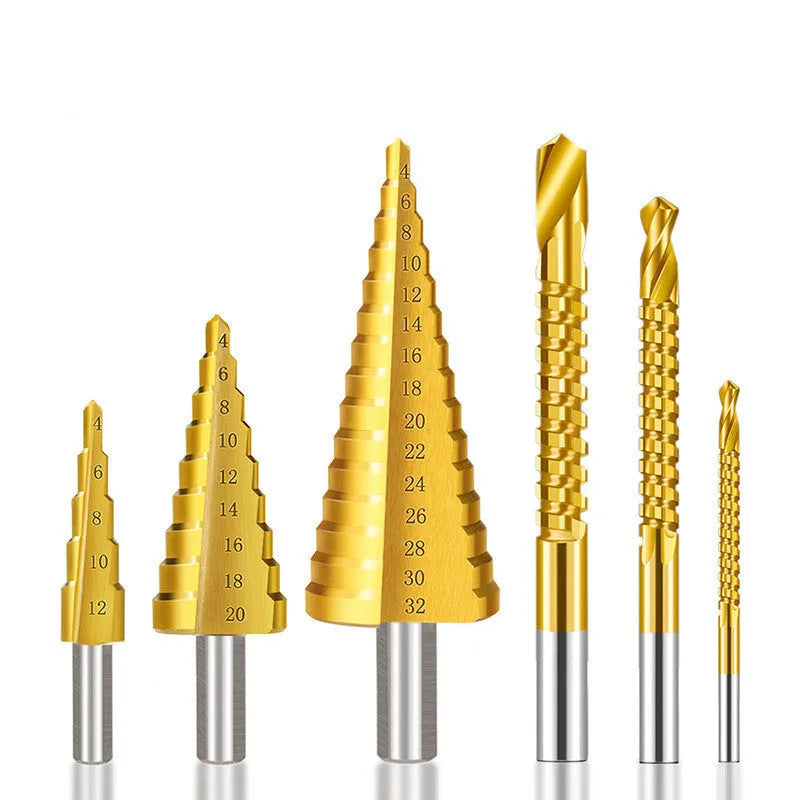 High speed steel cone step drill bits and a centre punch arranged on a workshop bench.
