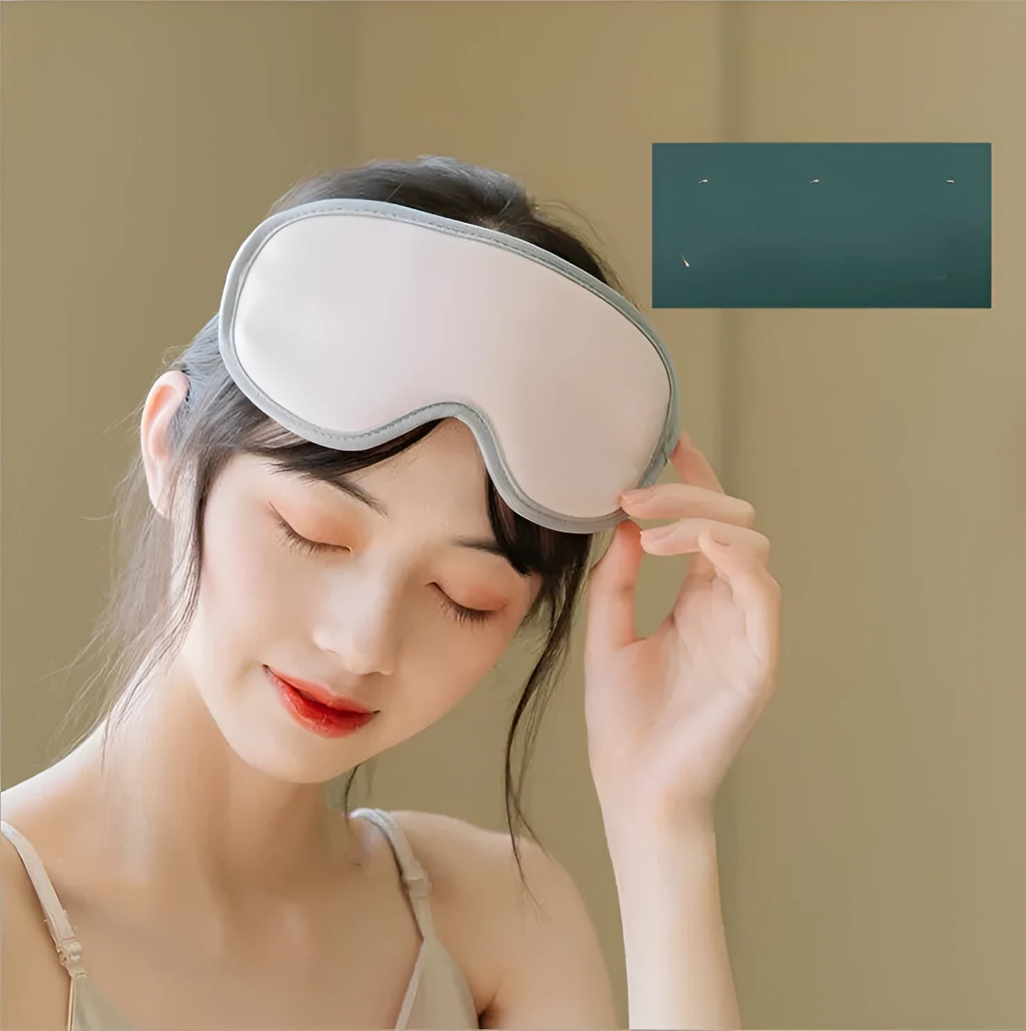 Portable pink eye SPA massage goggles showing suede shell and super fibre padding