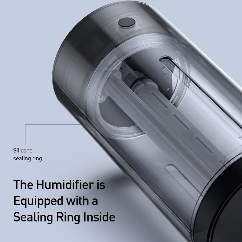 Black aluminium alloy car diffuser humidifier with air purification function on a desktop.